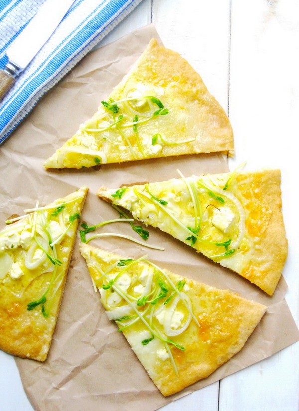 Wheat Pizzas with Cheeses and Pea Shoots